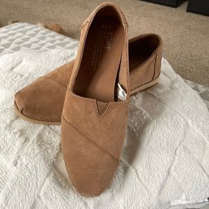 Toms brown suede slip on.  New without tags.  Sz 8.5 womens